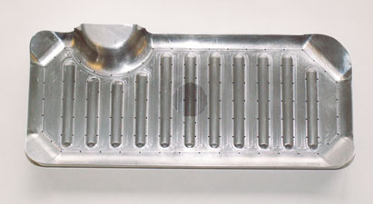 Shaped bacon pack, with ferrous insert for lifting by magnet